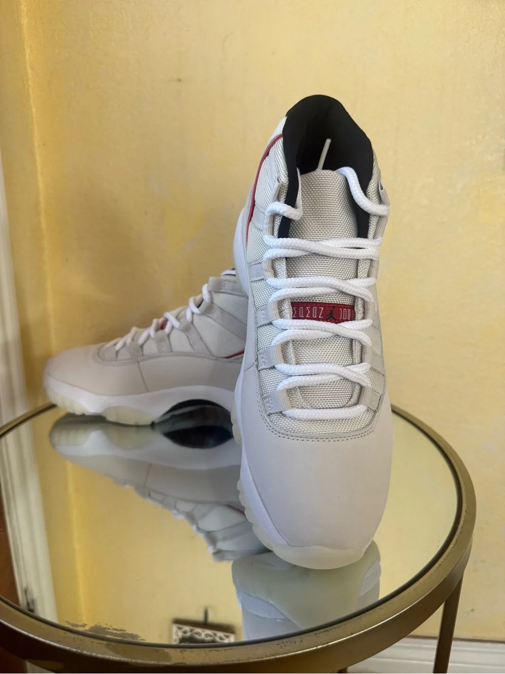 NEW Air Jordan 11 Retro in Platinum Tint and University Red